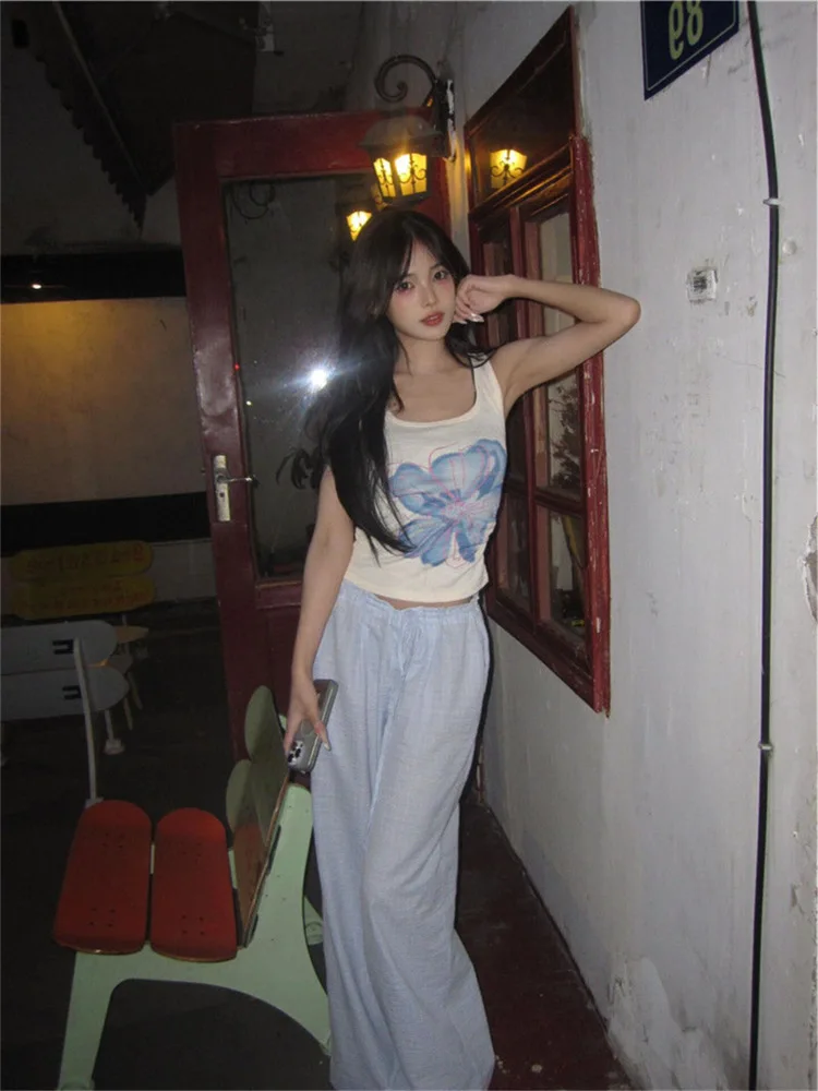 태국 스타일 매운 소녀 순수한 욕망 작은 난초 프린트 스트랩 조끼 여성 슬리밍 여름 탑 내부 및 외부 착용 유행