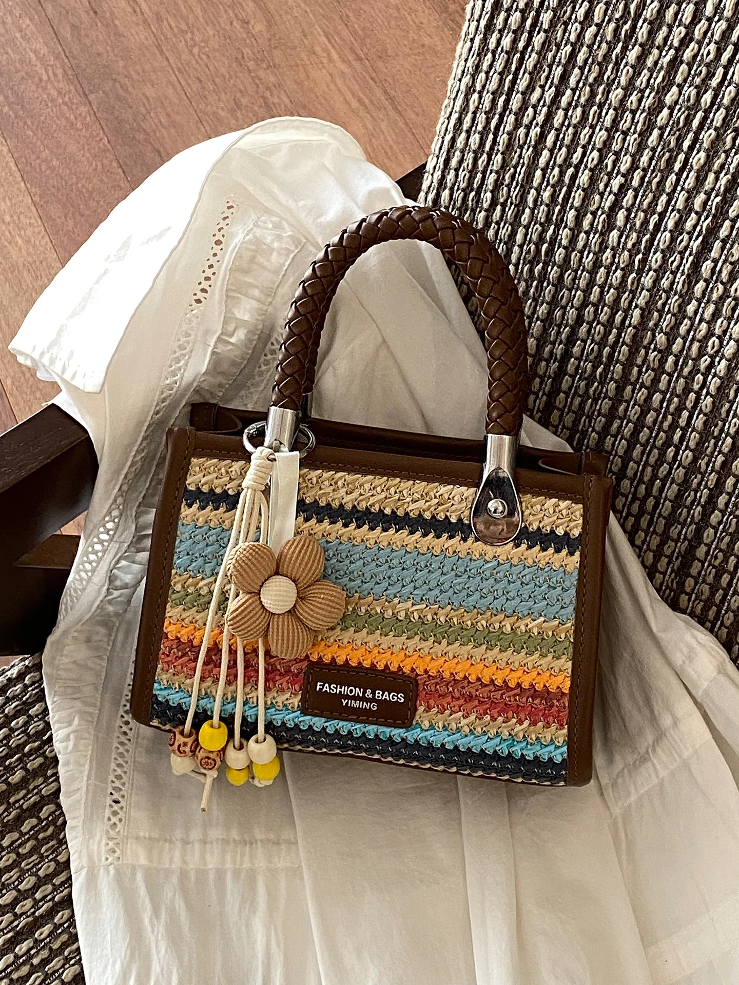 

Rainbow Woven Shoulder Bag Women's Summer 2026 New Vacation Beach Handheld Commuter Small Square Bag Casual Simple Style