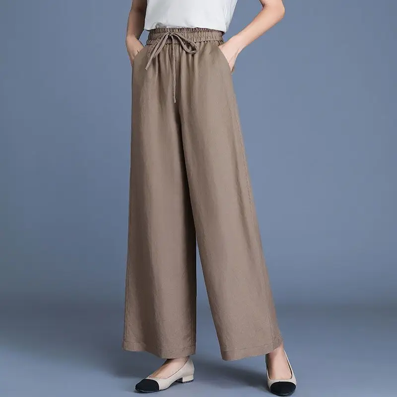 Pantalones de pierna ancha con cintura elástica para mujer, pantalones de cáñamo de algodón de cintura alta con bolsillos de retales, Color sólido, primavera y verano, nuevo