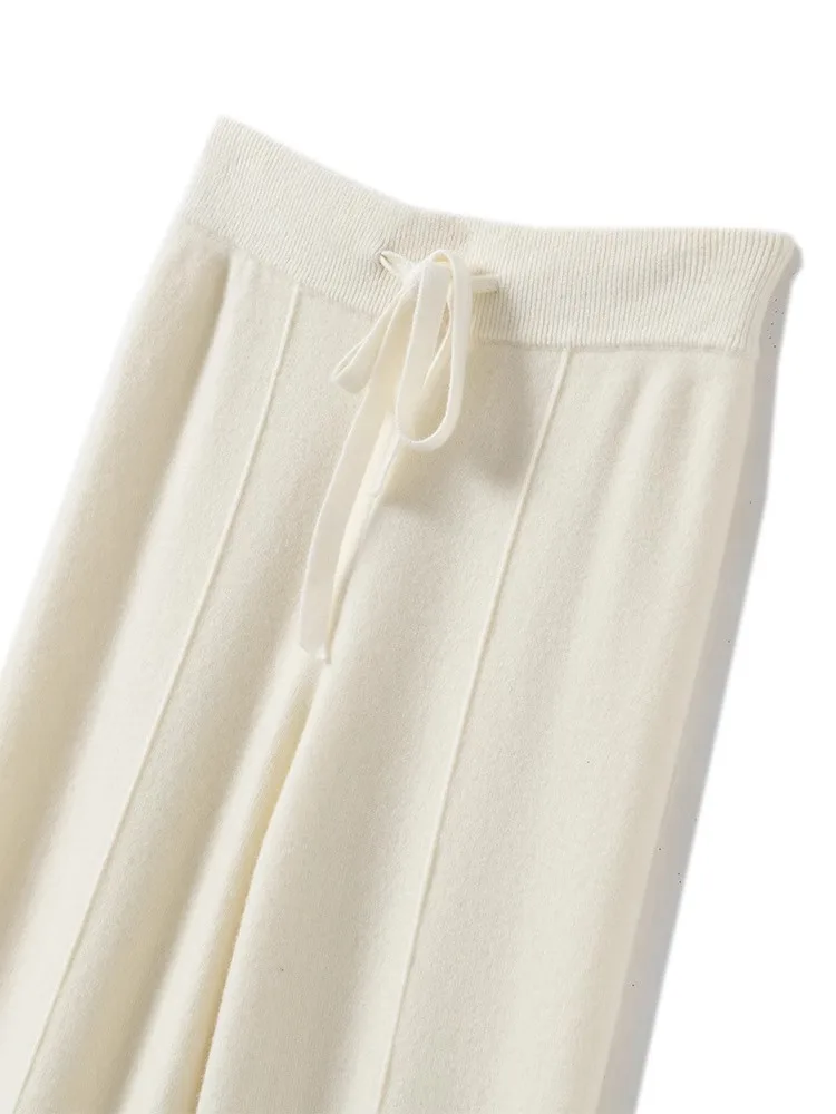 بنطلون نسائي واسع الساق من الصوف المحبوك بخصر مرتفع، فضفاض وعصري، طويل يصل للأرض مع حبل للربط