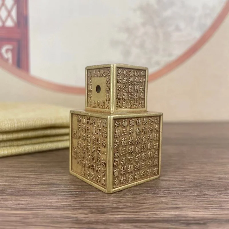 Solid brass six-sided heart sutra seal engraved with the Prajna Paramita Buddha head, finely crafted stationery weight and paper