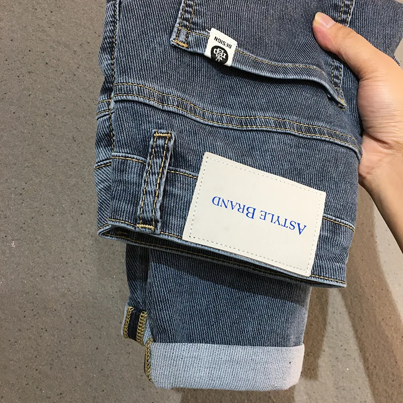 Celana Jeans biru pria, celana panjang regang kurus Slim Fit pria baru 2024