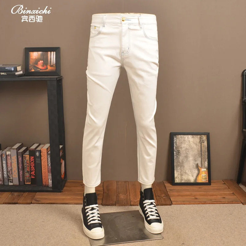 Pantalones vaqueros cortos blancos finos de verano para hombre, pantalones informales lavados de gama alta con pies pequeños elásticos a la moda para hombre
