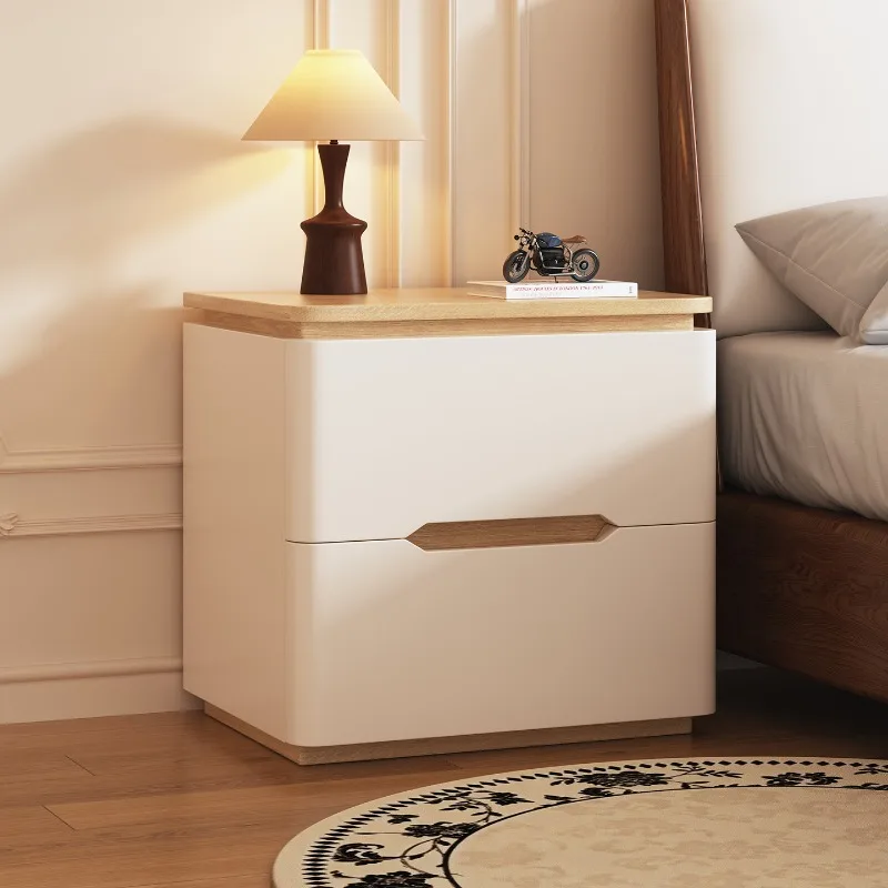 Solid wood bedside table 2026 new home bedroom light luxury high sense small medieval cream style storage cabinet