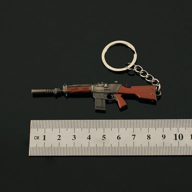 9cm Mini Gun Model Keychain Model Jewelry Weapon Metal Pendant Key Chain Chaveiro Bag Car Key Holders Gift For Kids Men