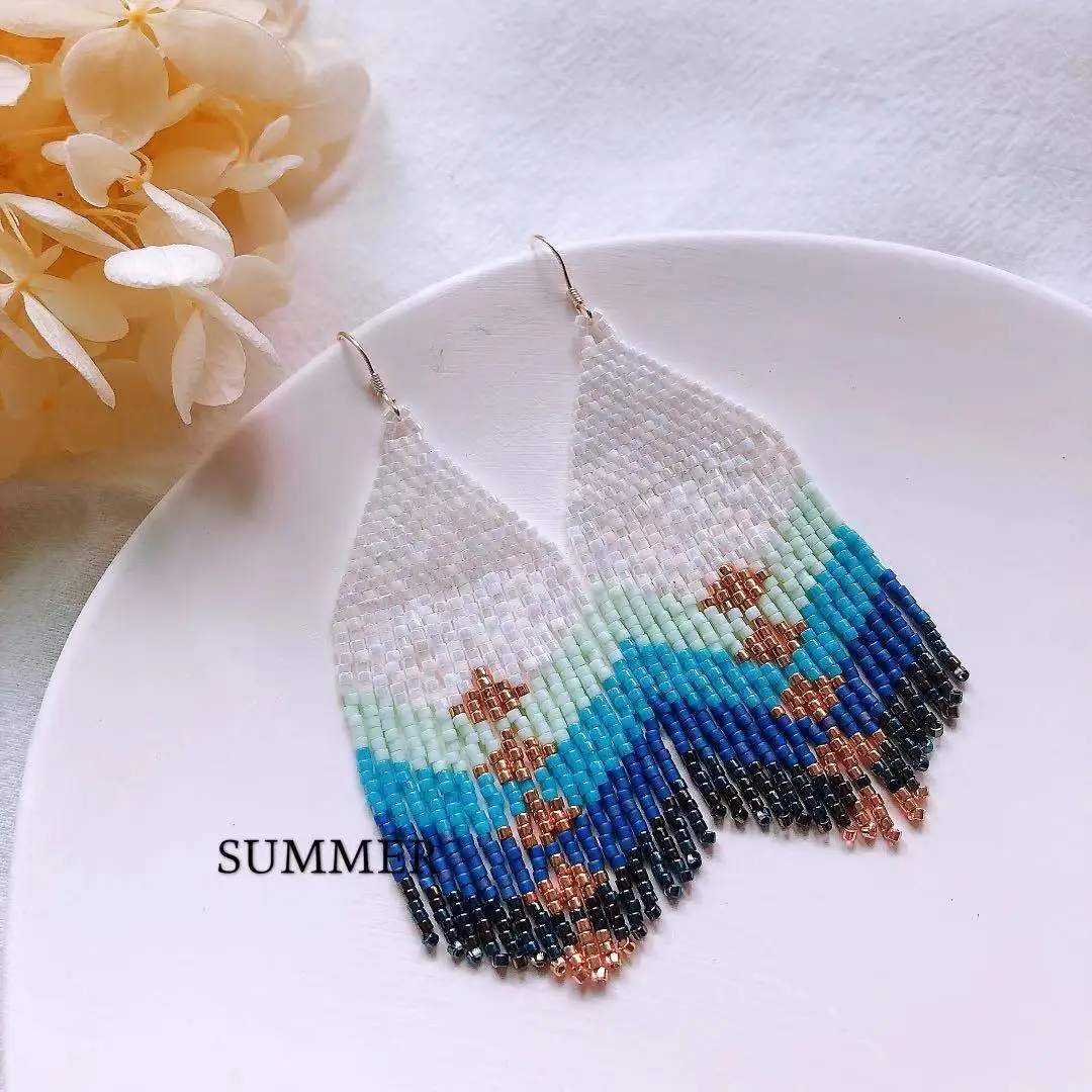 

Beaded earrings Tassel Originality Gradient Design Geometry Hand knitting Bohemia Alloy Tide Simple Rice bead earrings