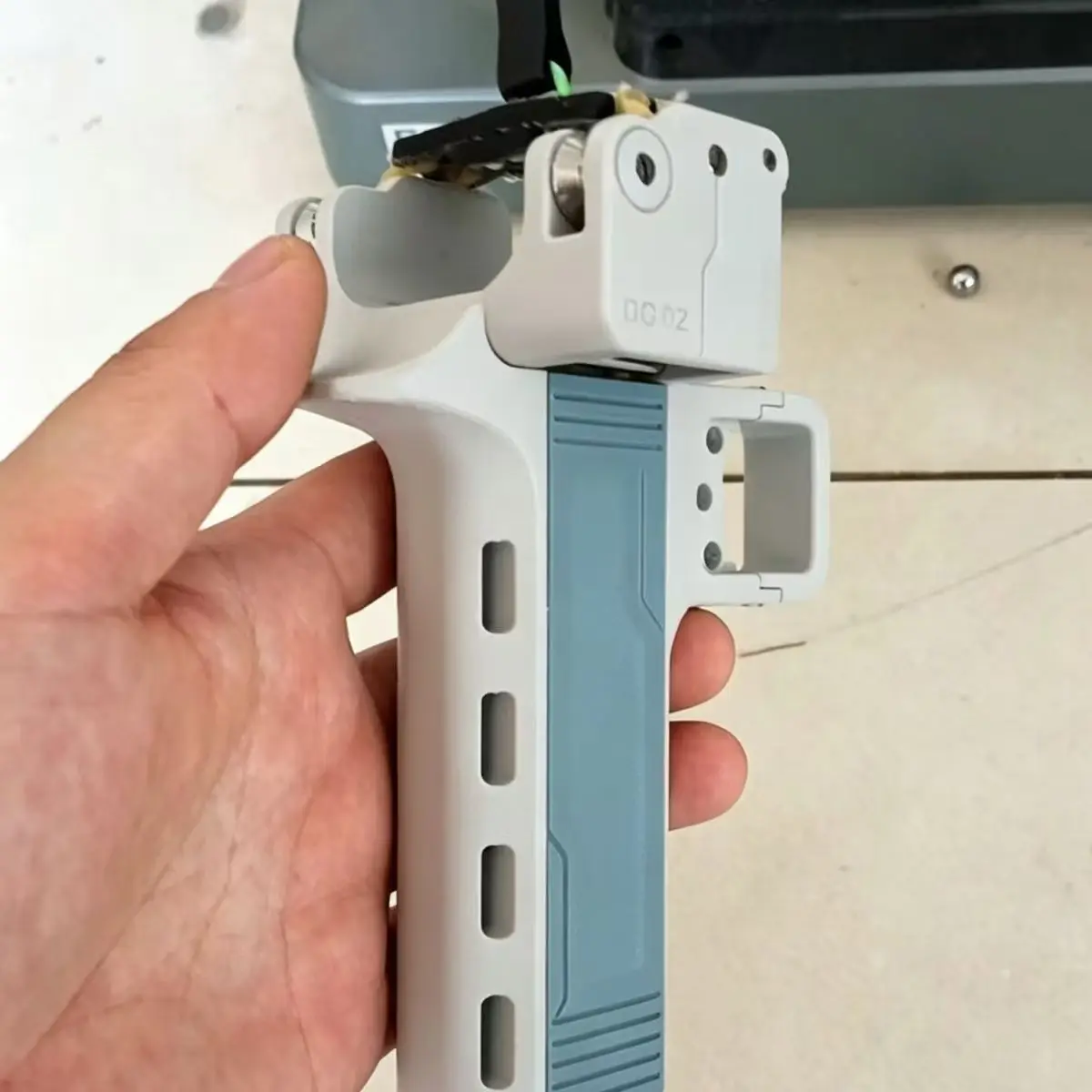 Outdoor Portable EDC 3D Printing Creative Automatic Loading Rapid Fire Slingshot Camping and Hiking Tool