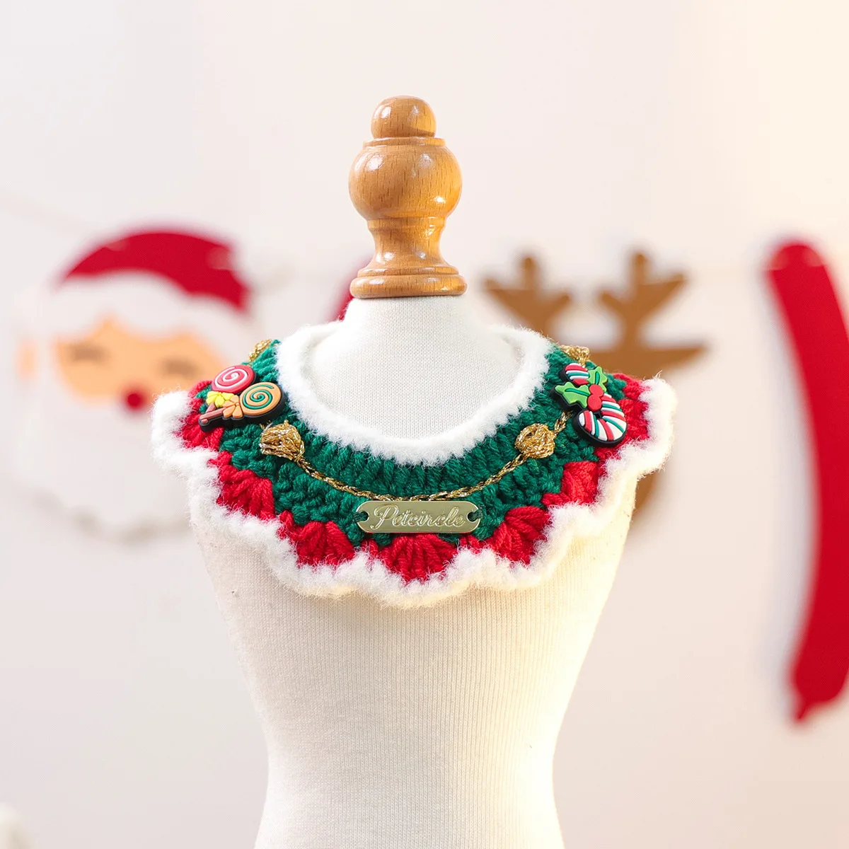 Collection of Christmas pet accessories including dog collars, dog saliva towels, cat scarves and cat neck collars