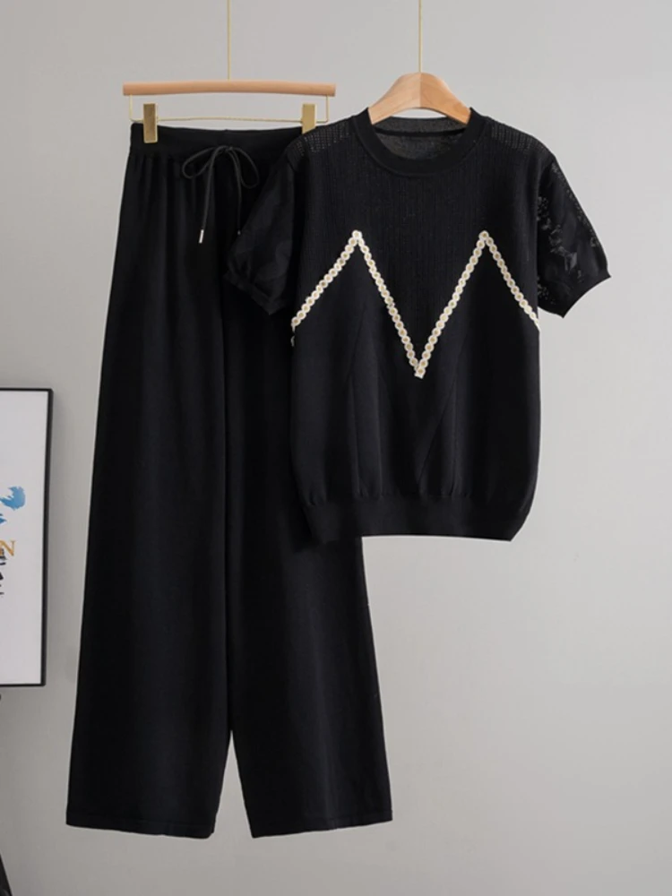 

2025 summer new women's slimming design hollow out top fashion wide leg pants European style fashion two-piece set