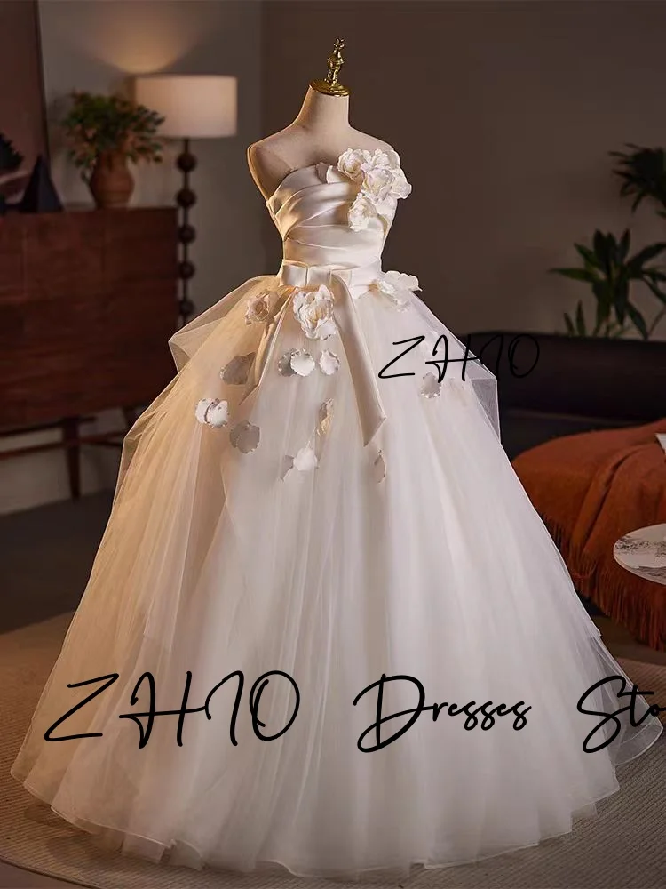 ZHIO Principessa Fiori 3D Abito da sposa Senza spalline A-Line Lunghezza pavimento Tulle avorio Corea Servizio fotografico Abito da ricevimento nuziale Personalizzato