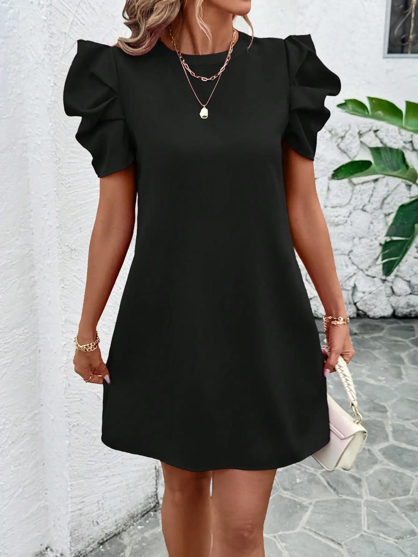

Women's Solid Black Round Neck Puff Sleeve A-Line Mini Dress