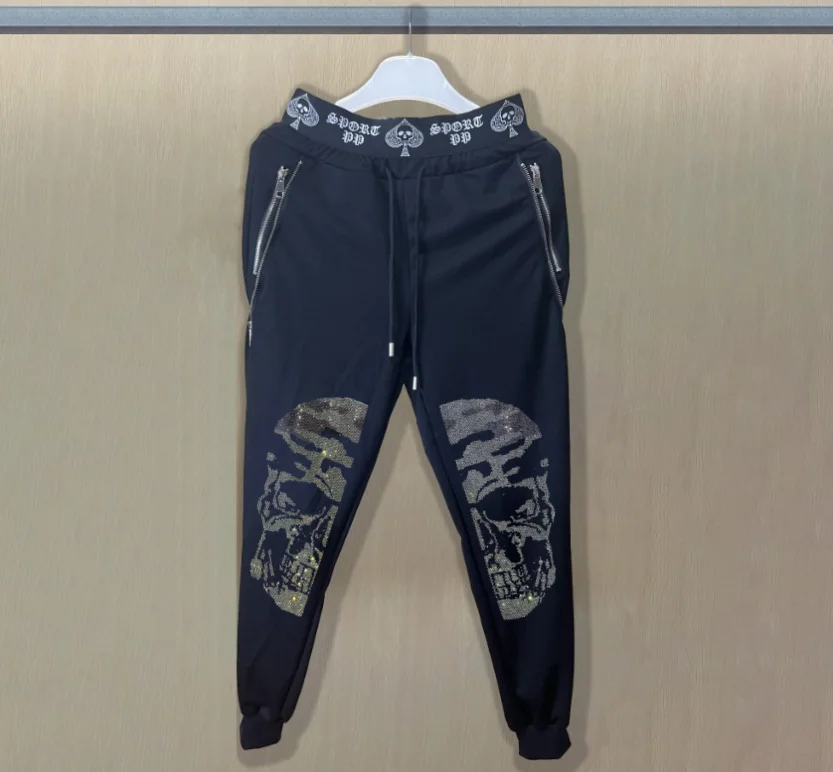 

Мужские дизайнерские спортивные штаны для бега, украшенные стразами, предназначенные для повседневной одежды, прикрашенные в гламурном порядке.