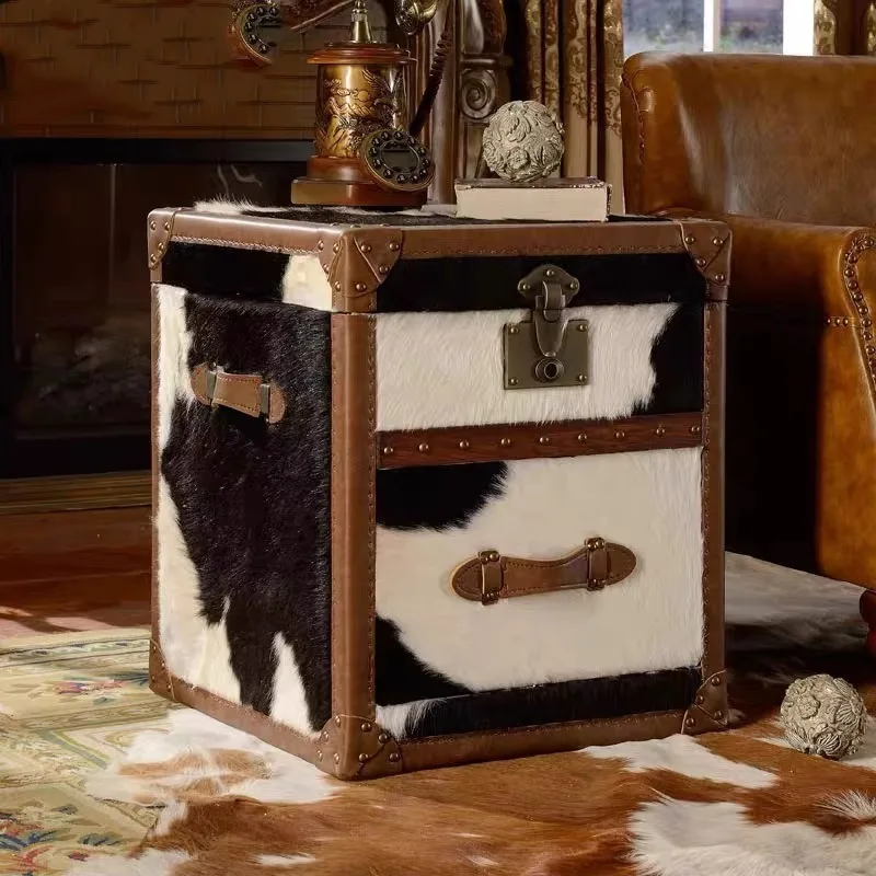 Natural black and white cow fur sofa edge a few retro corners a few brown and white cabinets