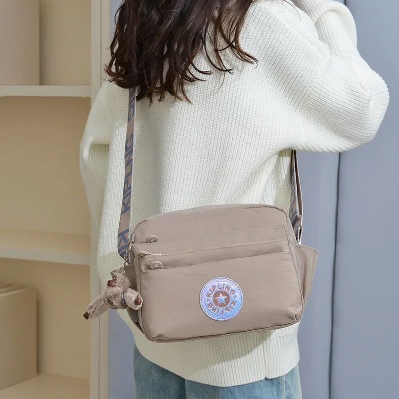 

2025 Water-Repellent Nylon Crossbody Bag Cute Monkey Charm Mini Shoulder Purse Ultra Light Square Bag for Women Shopping Travel