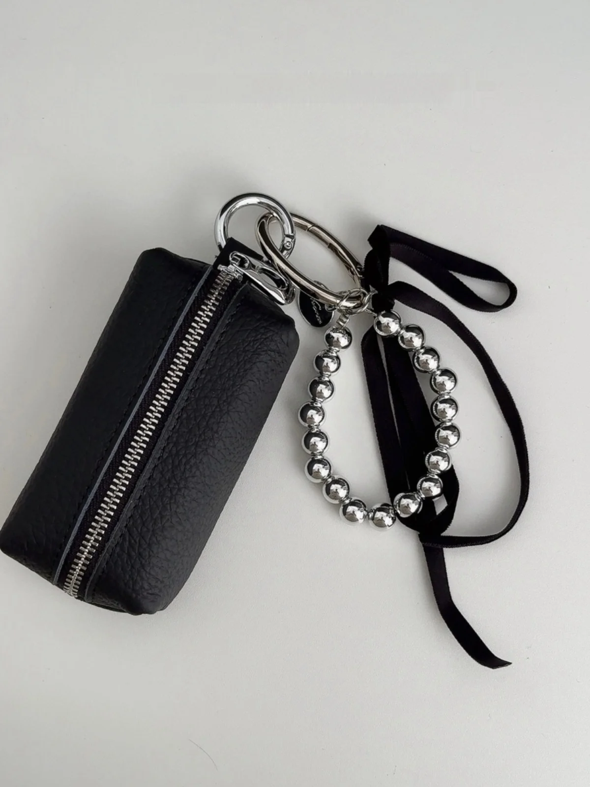 bolsa-de-chave-de-couro-com-ente-chaveiro-com-padrao-de-lichia-item-faion-com-f-de-ziper-em-forma-vertical