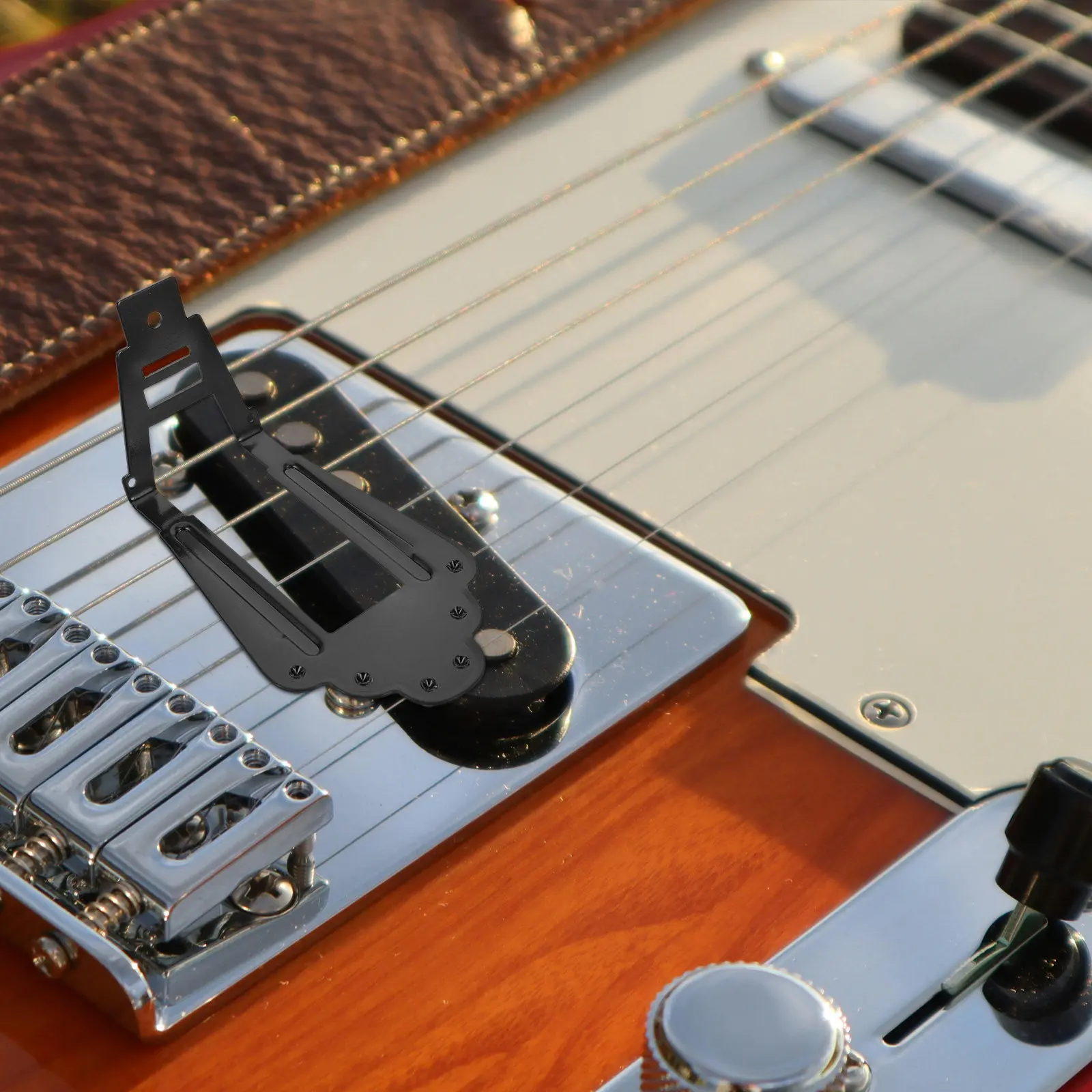 

Замена гитарного бриджа для 6-струнных гитар, черная отделка, минимизация потерь вибрации, идеально подходит для модификаций электрогитар и джазовых гитар.