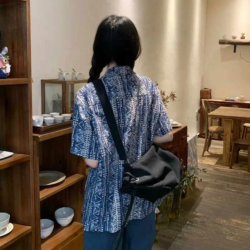 Camisa con cuello tipo Polo de manga corta con patrón de rayas únicas para mujer, Tops informales holgados con estampado para ir al trabajo, ropa de moda para mujer