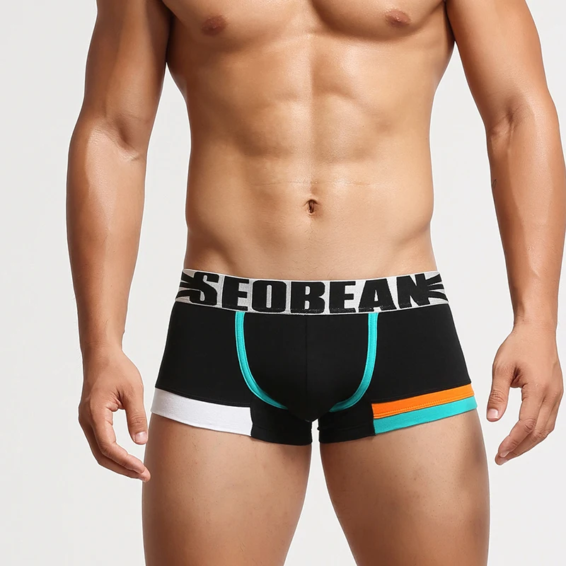 Men's flat underwear with high elasticity, breathability, solid color, youth, sexy, fashionable, low waist, four cornered shorts