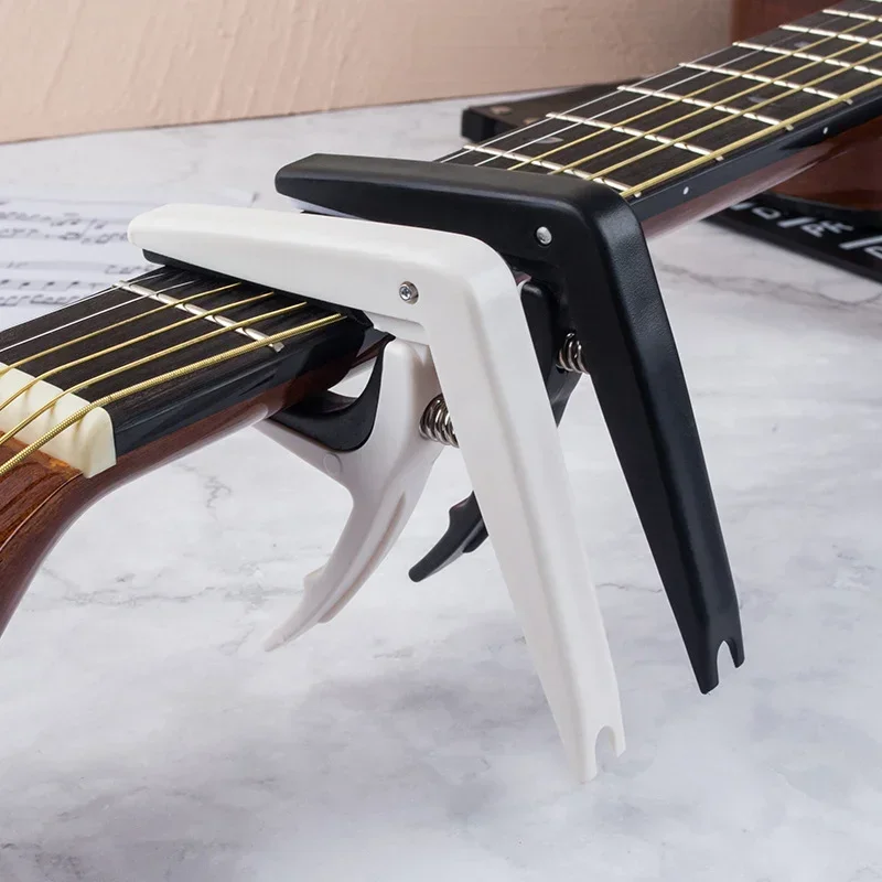 Capo de guitarra Universal ABS + Metal, llave de abrazadera de cambio rápido, accesorios de piezas de guitarra eléctrica clásica acústica, 1 unidad