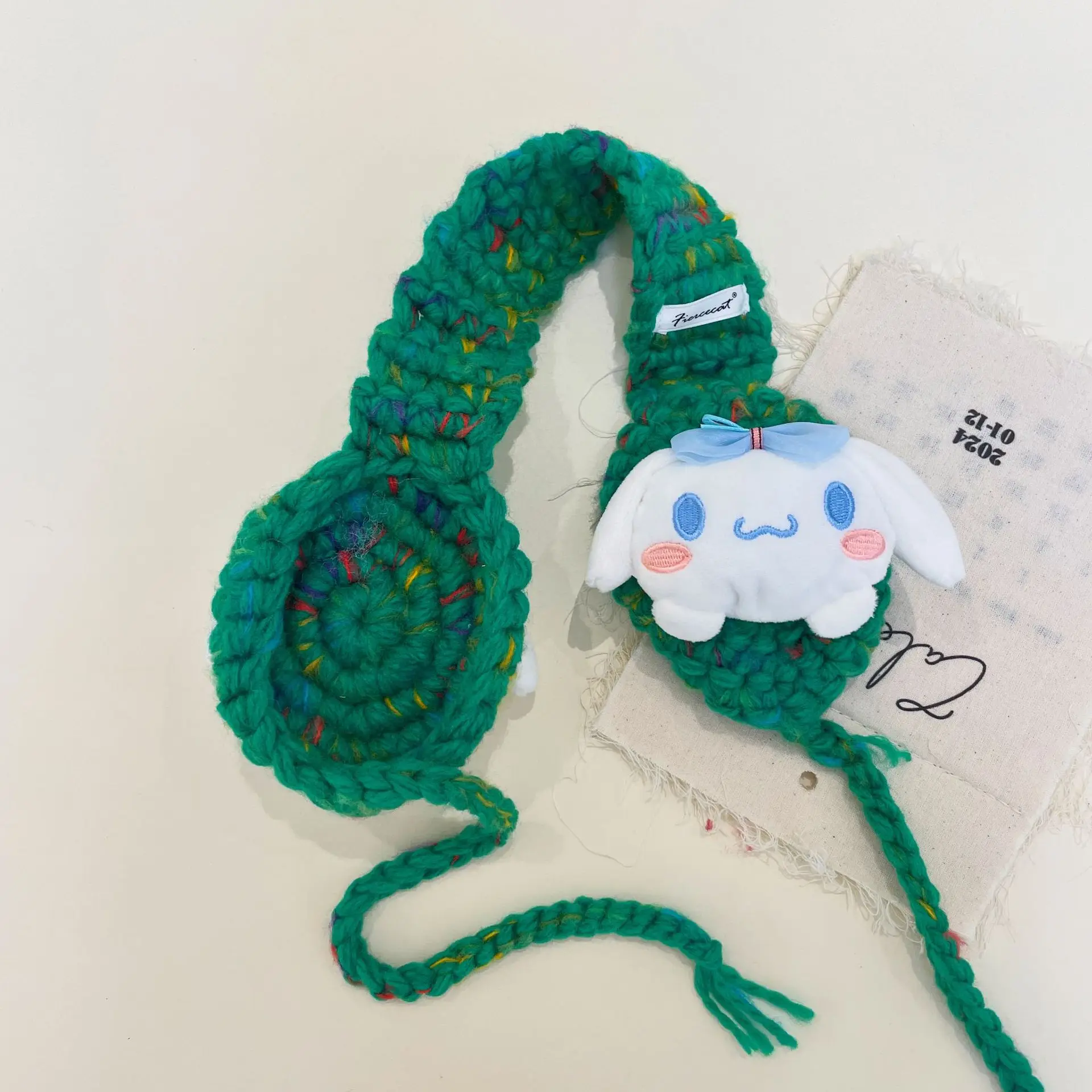 MINISO Sanrio 겨울 따뜻한 만화 양모 공 테더 학생 귀 보호 사이클링 니트 귀마개 따뜻한 양모 귀마개