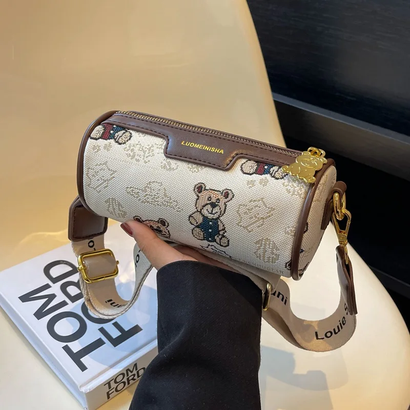 

2025 New! Fashion Women's Versatile Wide Strap Cylinder Bag - High-End Niche Messenger