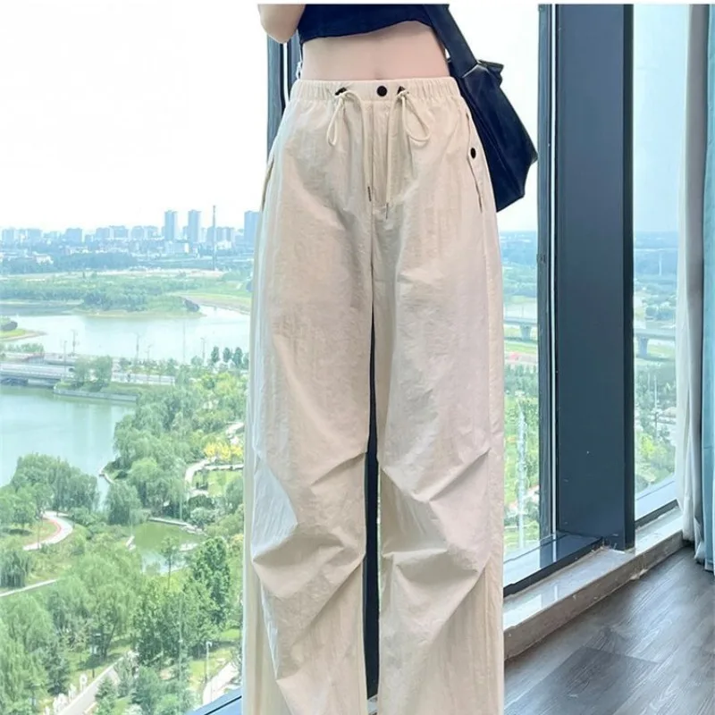 

Women's Spring Summer New Solid Color Pockets Elastic Slim Waist Fashion Leisure Simple Sports Loose Wide Leg Strap Capris Pants