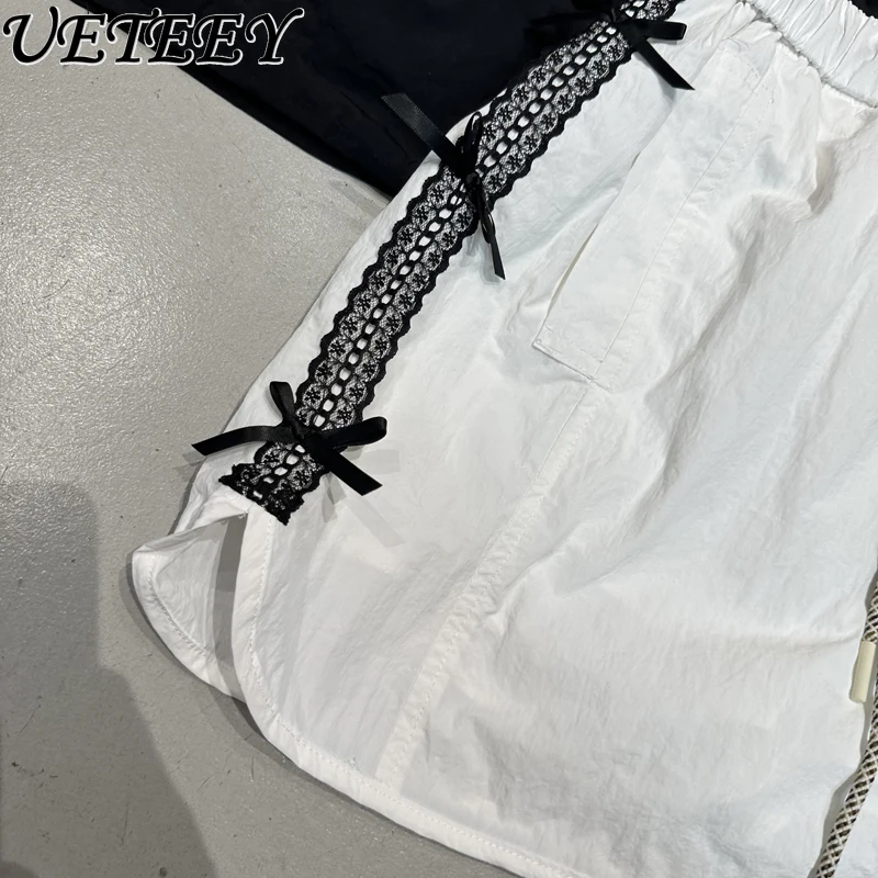 صيف جديد متعدد الاستخدامات الرباط مرونة عالية الخصر حافة الشريط تصميم تنورة قصيرة القوس المضادة للضوء بطانة ألف كلمة التنانير الصغيرة