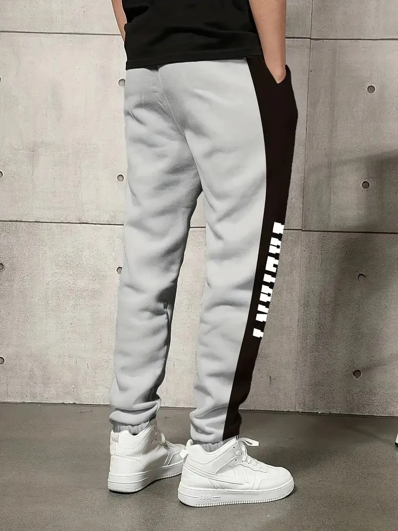 The new men's trousers for Spring and Autumn 2025 are comfortable soft casual and fashionable with letter prints