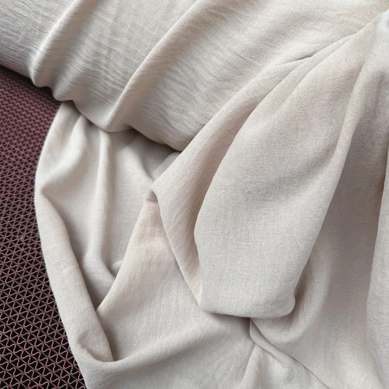 

Milk tea color wrinkled texture, linen cotton fabric skirt curtain photography, dessert table background, hanging fabric curtain
