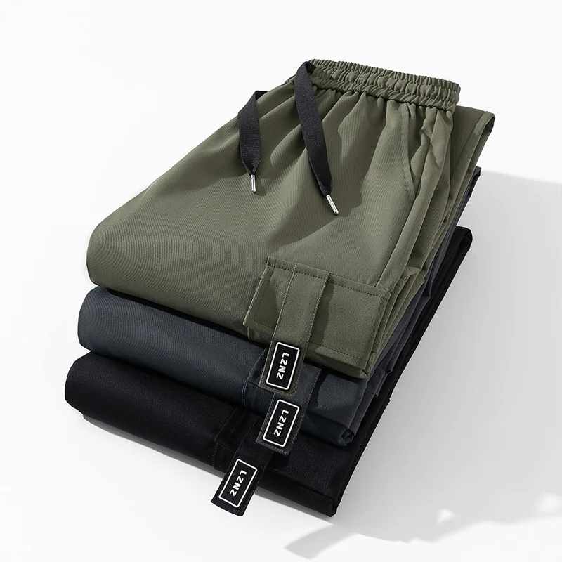 調節可能な巾着ゴムウエストバンド付きのメンズファッショナブルな巾着パンツ、ルーズフィット、マルチカラーのオールシーズン快適さ