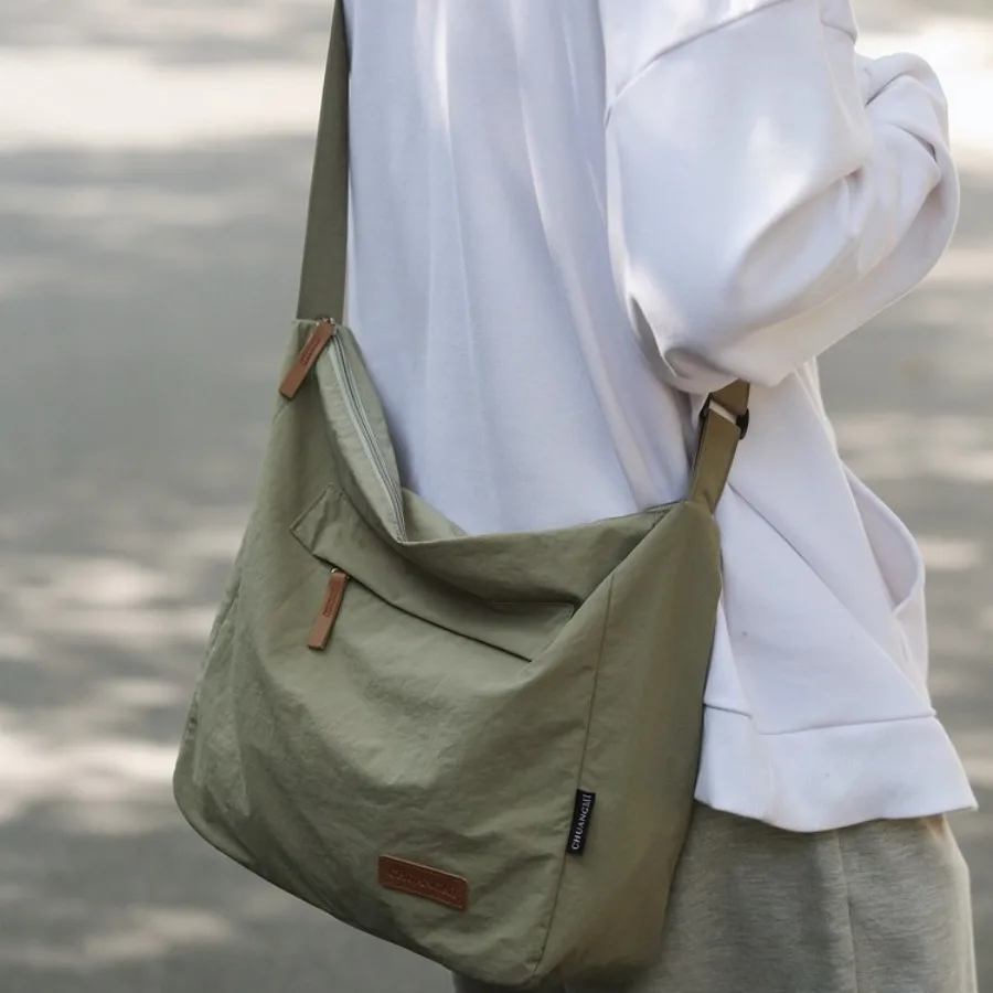 

【New style】Men's shoulder bag light cloth bag women's large-capacity backpack men's all-matching Japanese -body bag college stu