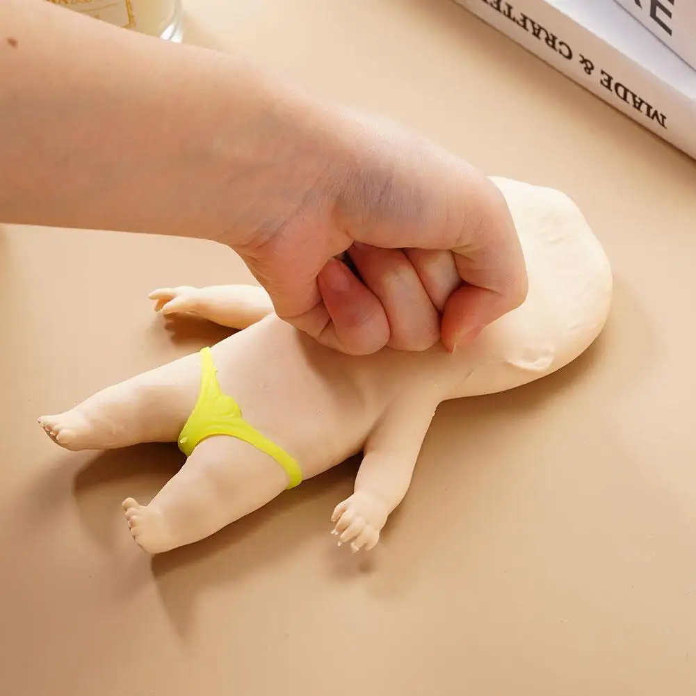 Muñeca de descompresión pellizco divertido Palma africana muñeca pequeña extraño interesante divertida muñeca fea juguete ventilatorio muñeca amasar juguete