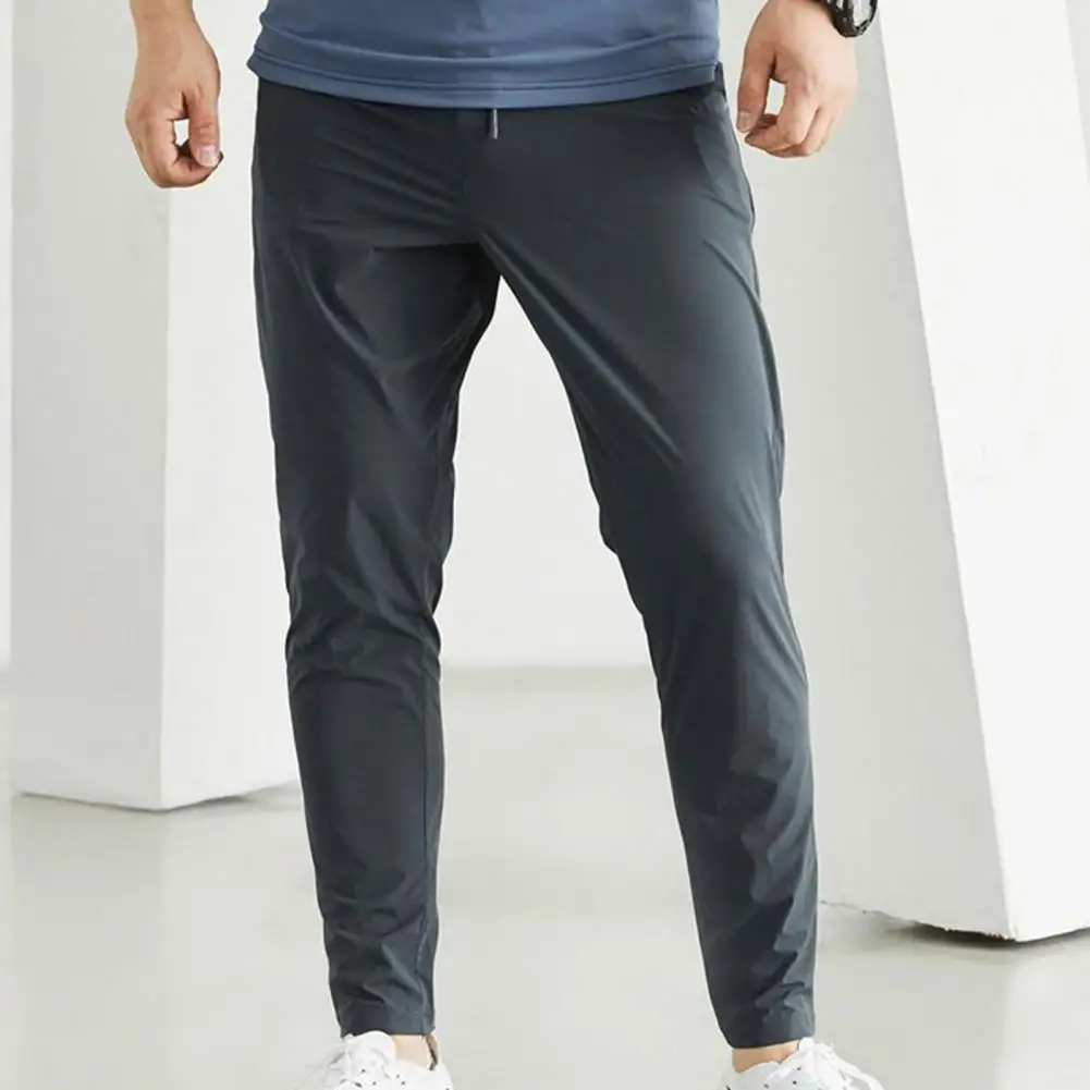 

Elastic Waistband Men Athletic Bottoms Slim Fit Men's Jogging Pants with Drawstring Waist Pockets for Running Outdoor Activities