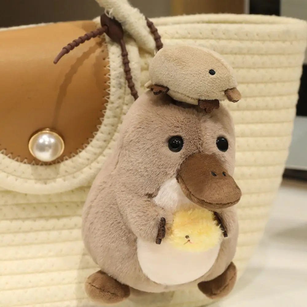 Niños Niñas Animal marino lontra sello Animal relleno tiburón giratorio ornitorrinco 15CM organismo marino lechuga rellena mochila colgante