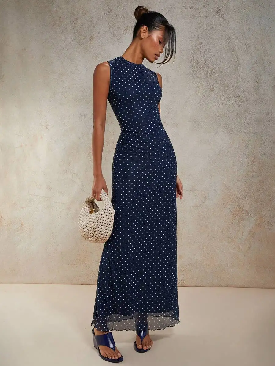 

Темно-синее макси-платье без рукавов в горошек с фестончатым подолом