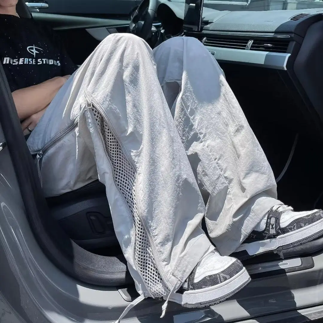 กางเกงลำลองสำหรับกิจกรรมกลางแจ้ง แห้งเร็ว ระบายอากาศได้ดี มีซิป เหมาะสำหรับฤดูร้อน ทรงขาตรง สไตล์ลำลอง ผลิตจากเส้นใยโพลีเอสเตอร์