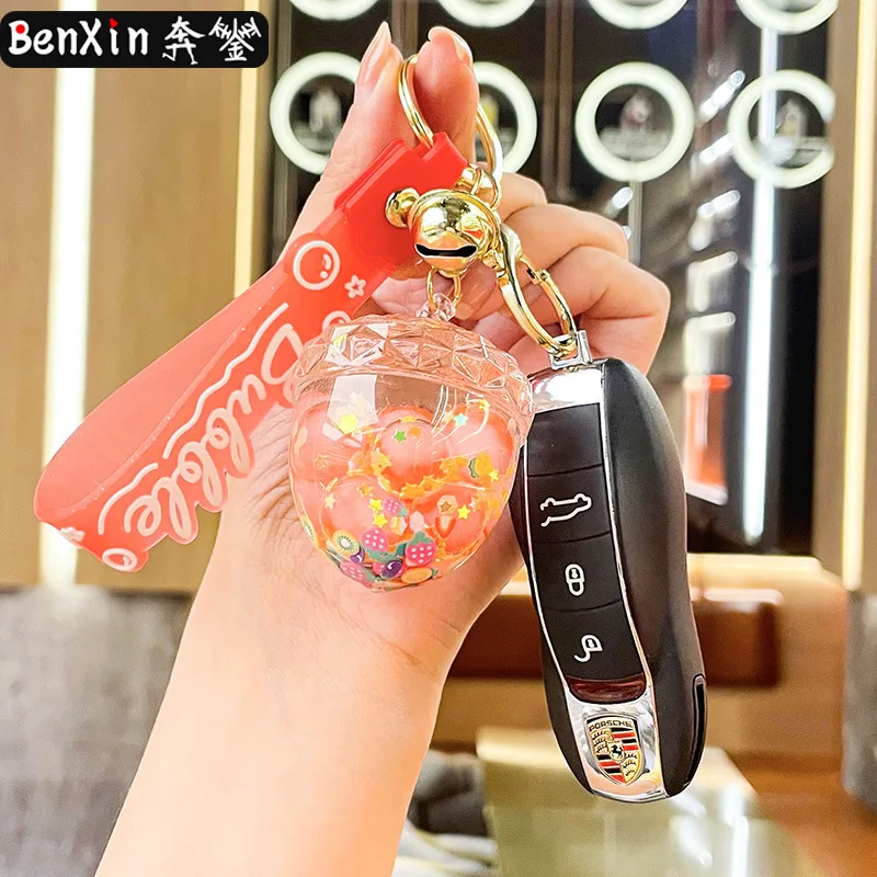 قلادة سيارة من سلسلة مفاتيح كوز الصنوبر المضيئة المشربة بالزيت من مينسو، زخرفة سلسلة مفاتيح رائعة على شكل حقيبة