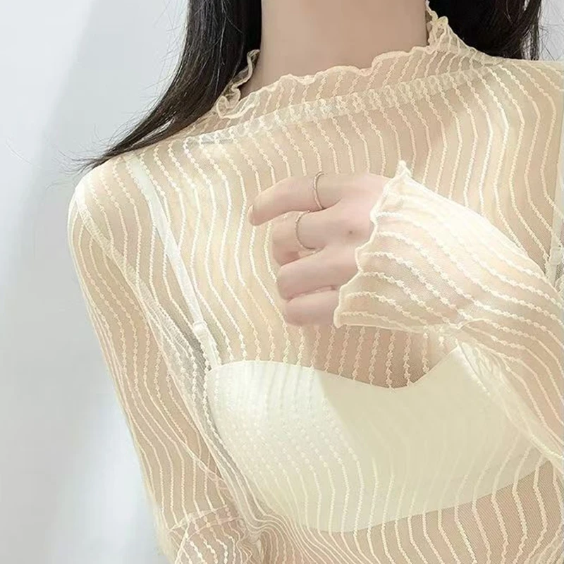 Malha sólida ver através de blusas femininas protetor solar roupas sexy oco manga longa gola alta transparente topo branco camisa de festa