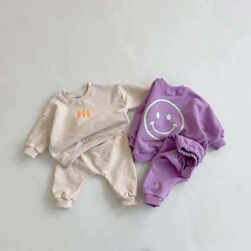 

2025 Autumn/Winter New Children's Smiling Face Letter Printed Cotton Soft Hoodie and Pants Two-piece Set