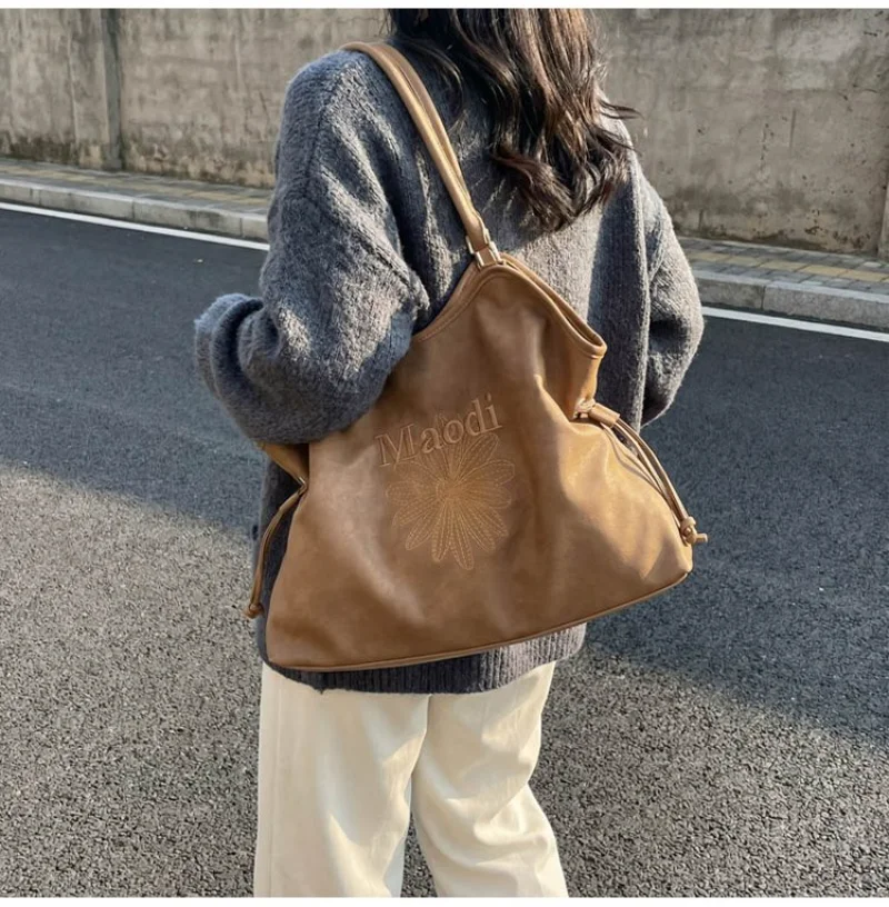 

Multi-purpose Leather Shoulder Bag with Embroidery Detail for Women's Everyday School Office Casual Weekend Errands & Daily Use