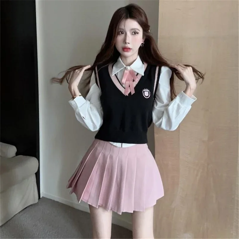 Seragam sekolah cantik Korea, baju rompi wanita + rompi rajut + rok lipit merah muda musim semi/gugur gaya Amerika JK