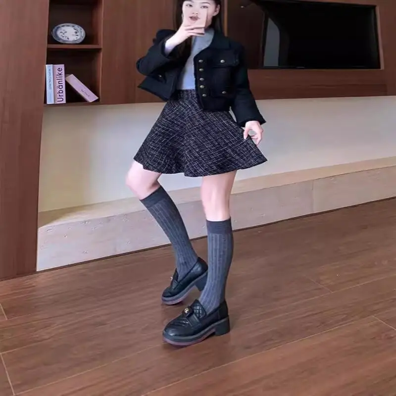 Geruite rok Dames Hoge taille Minimalistisch Modieus Kantoorkleding Veelzijdige rok Broek Herfst Winter Korte rok Leuke nieuwe stijl