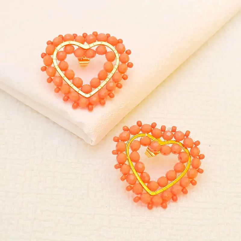 

Beaded earrings Heart-shaped Crystal Originality Hollow out Hand knitting Bohemia Alloy Tide Simple Rice bead earrings