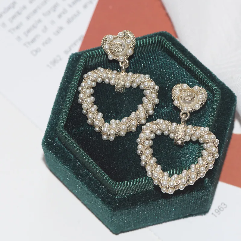 

Pearl retro peach heart earrings high-end light luxury earrings