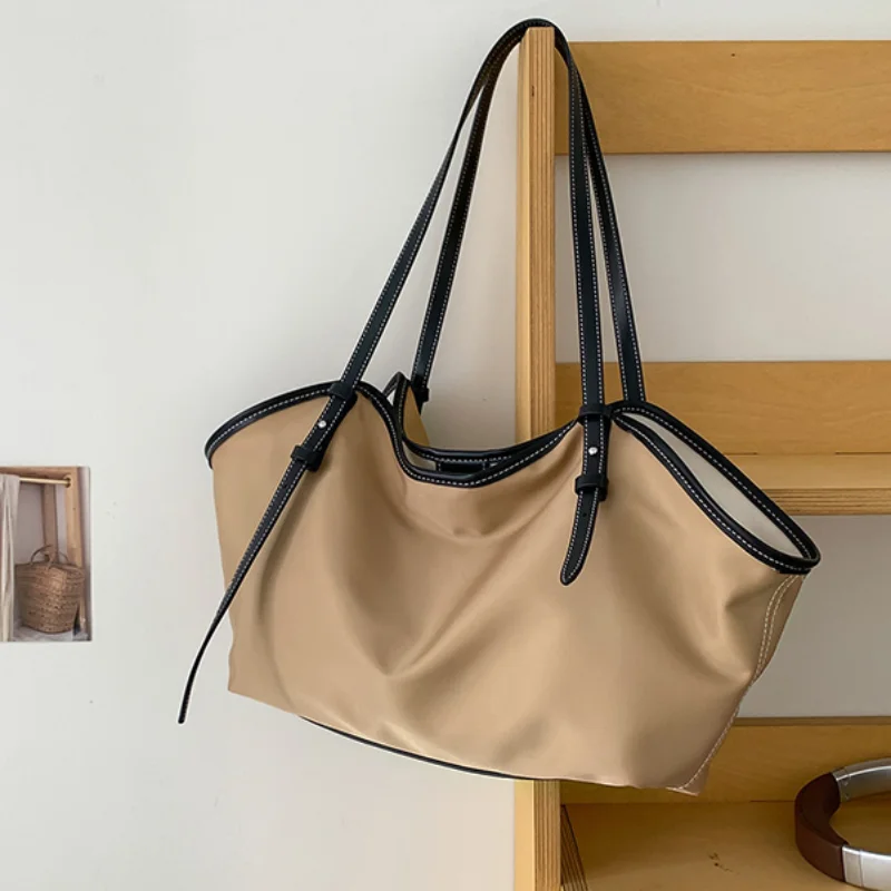 

Women's Fashion Versatile Large-capacity Canvas Shoulder Bags Designer Canvas Wings Handbags Ladies Leisure Dumpling Tote Bag