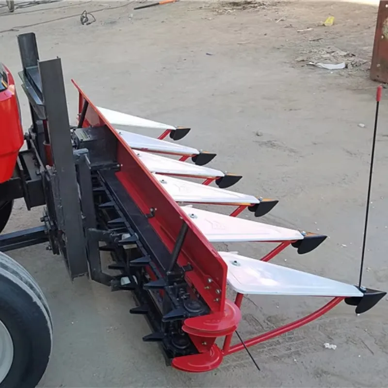 The Harvester Is Used for Harvesting Straw Crops and Is of the Self-propelled Tractor Type.