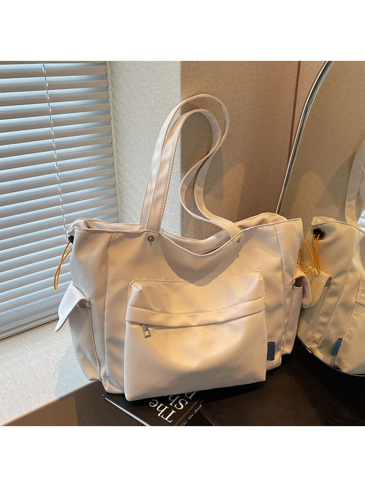 

Большая вместительная холщовая сумка-тоут для женщин, городская сумка, школьная сумка, новинка 2025 года, с мягкой ручкой, на молнии, из дышащего полиэстера