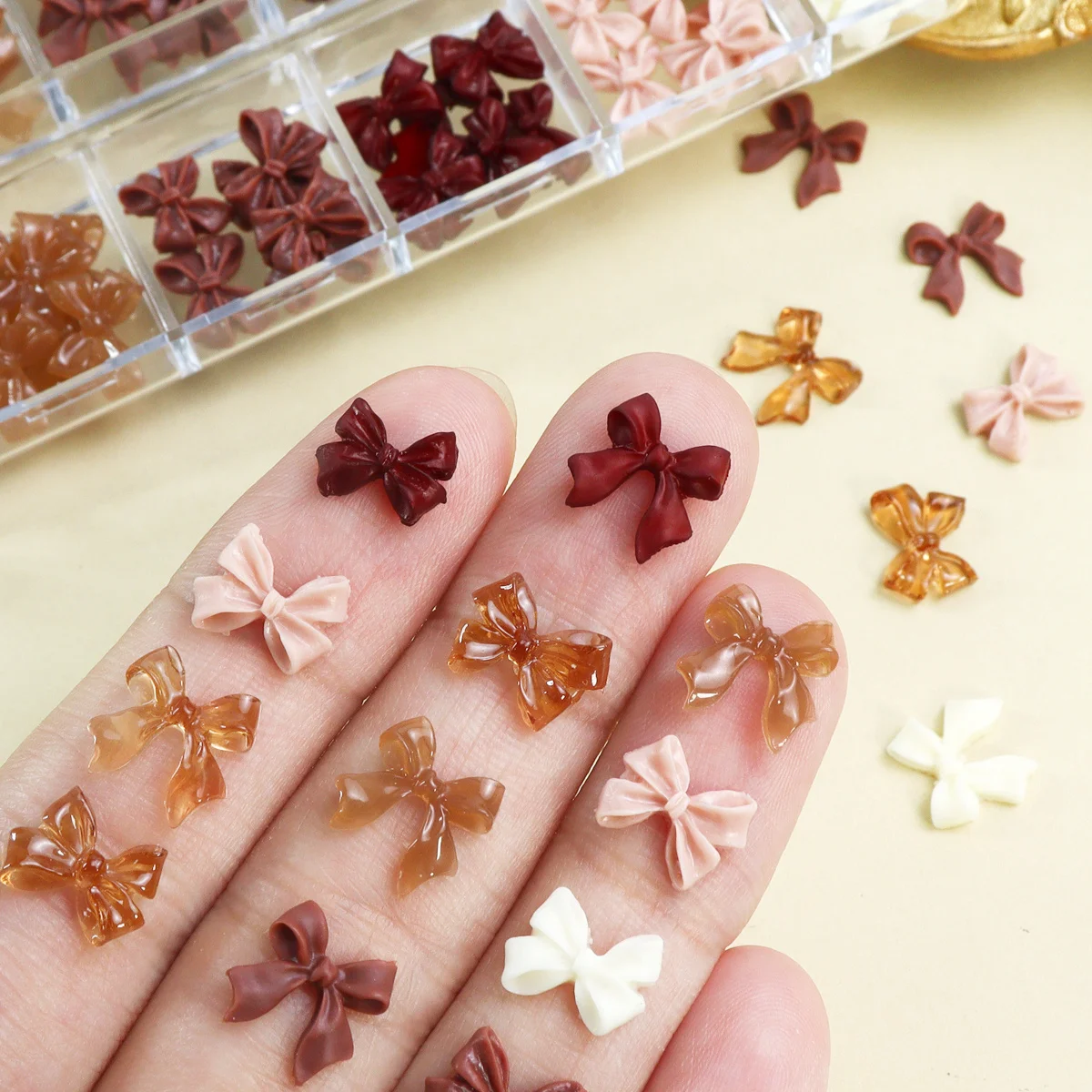 A Set of for nail Decoration Supplies Featuring Brown Ribbon Bows, Resin Bow Ties, And Rhinestone Bowknot Charms, Perfect for 3D