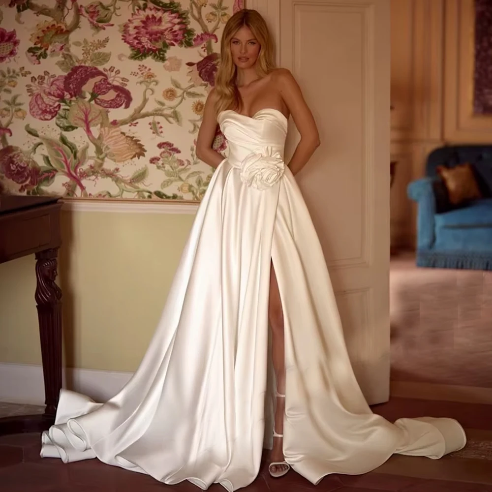 فساتين زفاف ساحرة مخصصة من الساتان للنساء العروس شق قبالة الكتف زهور ثلاثية الأبعاد رداء الأرض - فستان زفاف بطول الأرض