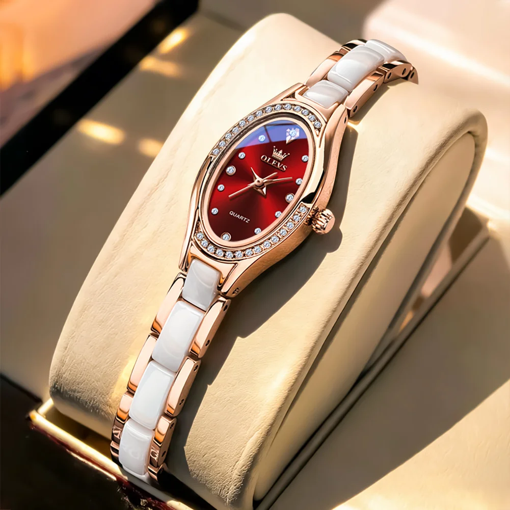 

Новые женские модные элегантные кварцевые часы OLEVS с классическим овальным циферблатом, инкрустированным бриллиантами, роскошным керамическим ремешком, водонепроницаемые женские часы